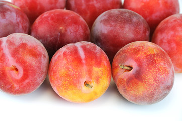 fresh plum isolated on white background