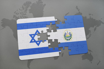 Fototapeta premium puzzle with the national flag of israel and el salvador on a world map background.