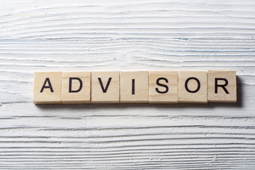 the word of ADVISOR on wooden cubes