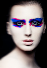 Beauty creative art makeup on black background