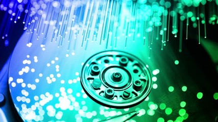 pc hard disk with Fiber optics background, shot in HD