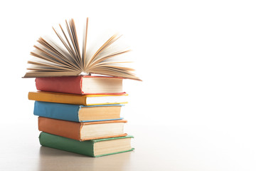 Fototapeta premium Stack of books on white background. Education concept. Back to school.