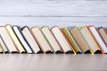 Stack of colorful books. Education background. Back to school. Copy space for text.