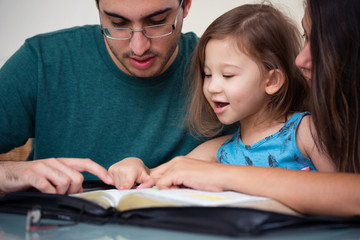 Family Reading the Bible Together