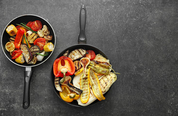 Grilled vegetables on pans, closeup