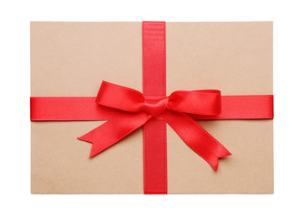 Gift card with a red ribbon isolated on white