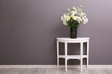 Beautiful flower bouquet on grey wall background