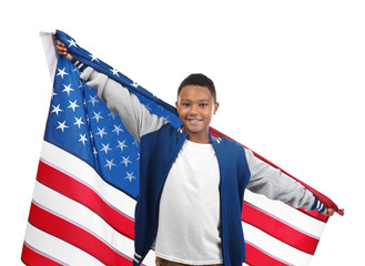 Boy holding American flag, isolated on white