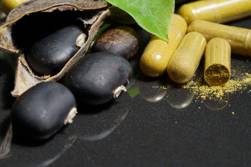 The seeds of Velvet bean or Mucuna pruriens with pill of capsule that contain crushed of mucuna pruriens seed, have been used for traditional medicine, selective focused