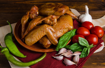 Grilled chicken set with vegetables on wood