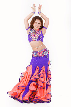Little girl belly dance isolated on white