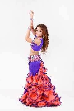 Little girl belly dance isolated on white