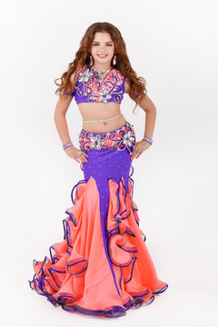 Little girl belly dance isolated on white