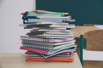 Stacked school notebooks closeup