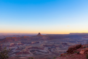 Fototapeta na wymiar Sunrise at Panorama Point in the Maze District of the Canyonlands National Park in Utah is always spectacular.