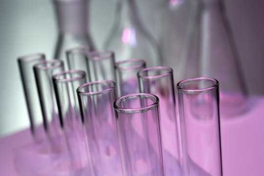 Test tubes on violet background