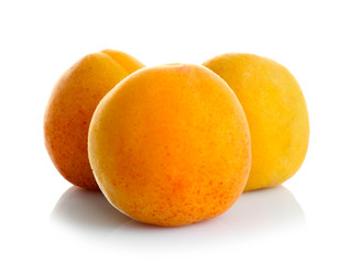 Fresh apricots isolated on white