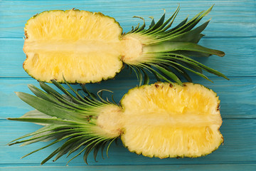 Pineapple slices on blue background