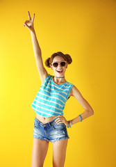 Beautiful girl on yellow background