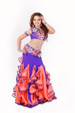 Little girl belly dance isolated on white