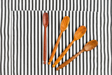 Closeup of kitchen utensils in pocket of apron