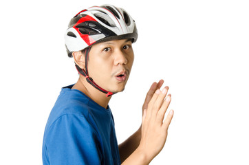 The man wearing bike helmet and put hands up to prevent something isolated on white background