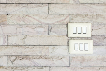 Fototapeta na wymiar Modern brick wall texture background and switch open light. deco