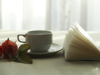 Fresh morning coffee on the bed, select focus.
