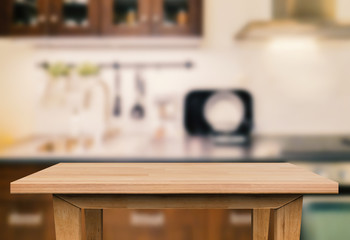 wooden table with kitchen background