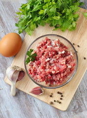 Raw minced beef in a bowl