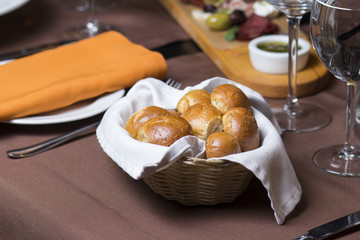 Pieces of bread on a basket in a restaurant