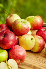 Apples  on brown wooden background