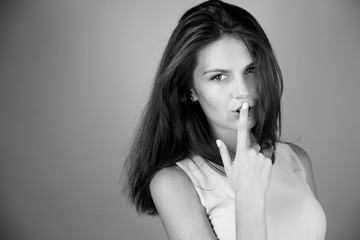 Naklejka premium Portrait of a beautiful young woman thinking