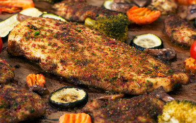 baked chicken breast in spicy spices with vegetables
