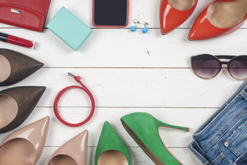 Women clothing set and accessories on light background.Top view