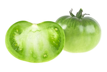 Green tomato and slice on white background