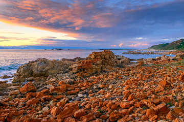 Dramatic sunset with clouds above the sea