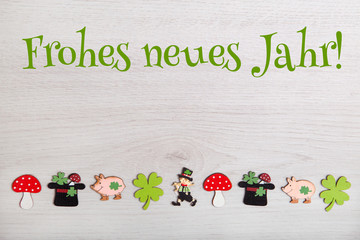 Hintergrund mit Glückssymbolen-Frohes neues Jahr