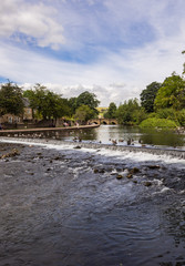 Weir on the river Wye at Bakewell, Derbyshire, UK