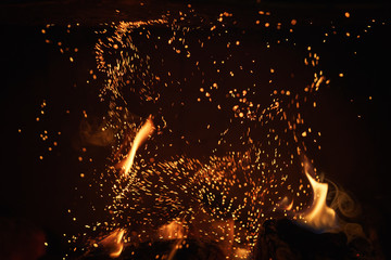 close up of charcoal burning in fireplace