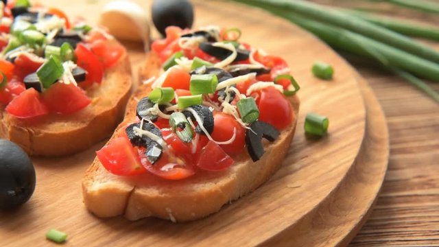 Fresh homemade crispy Italian Bruschetta with tomato, garlic and basil