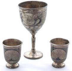 Set of silver wine glasses on a white background