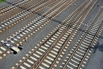Empty railway lines with railroad swtich near town station