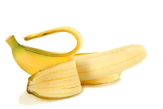 Peeled banana on white isolated background