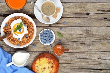 Homemade granola or muesli. Healthy breakfast with text space, top view. Health and diet concept.