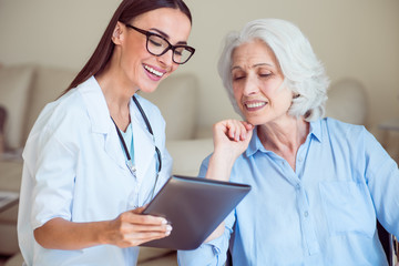 Nice doctor with senior patient