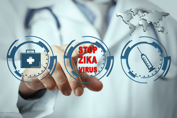 Zika virus danger concept. Doctor working with virtual screen, closeup. Button with text stop zika virus.