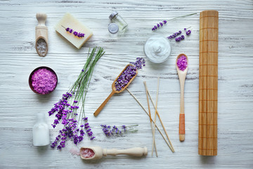 Fototapeta na wymiar Spa composition with lavender on white wooden background