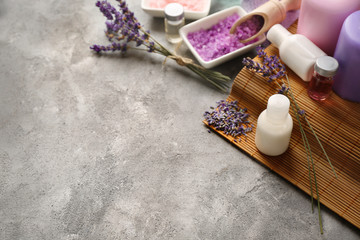 Obraz na płótnie Canvas Spa composition with lavender and salt on gray background