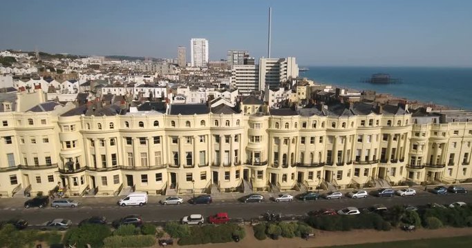 Aerial view of a regency square in Brighton and Hove with the town and the beach in the background